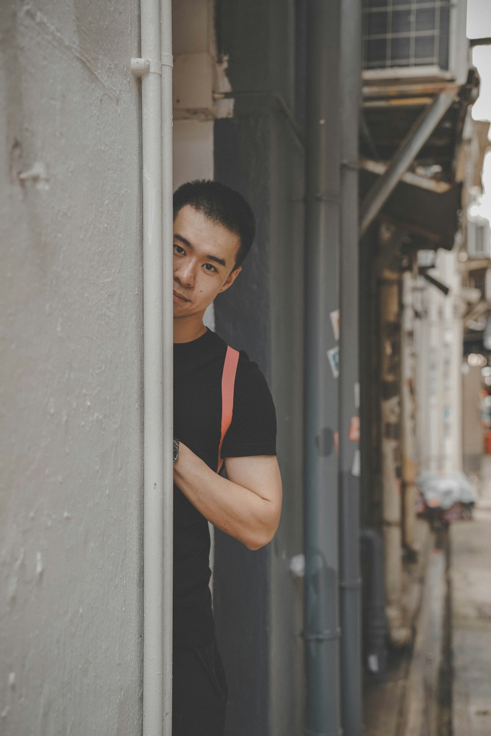 man standing near wall