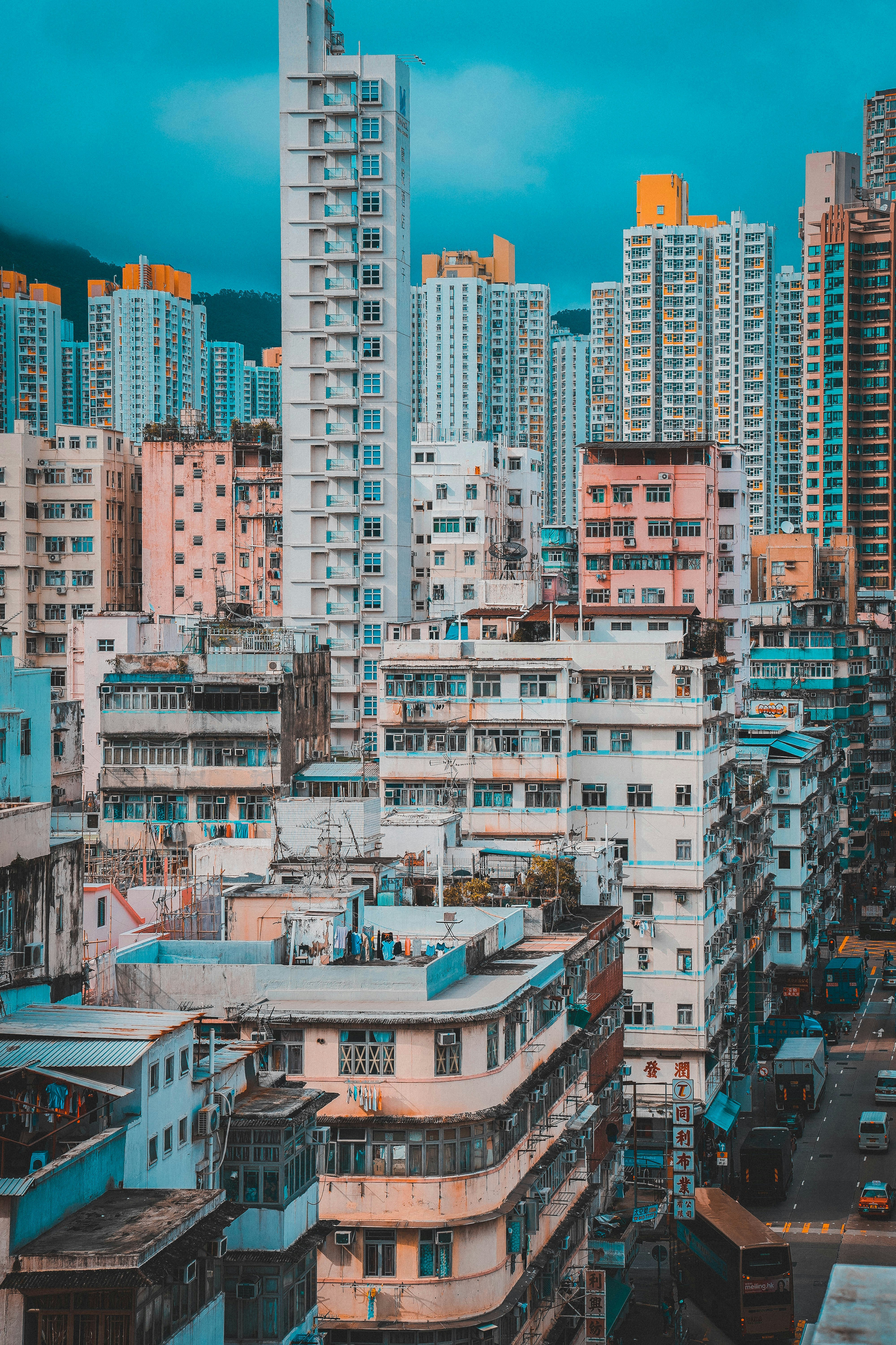 architectural photography of white and pink city buildings