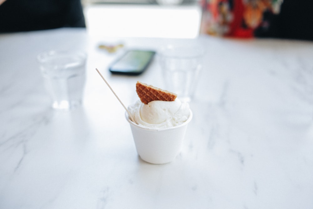 ice cream in white plastic cup
