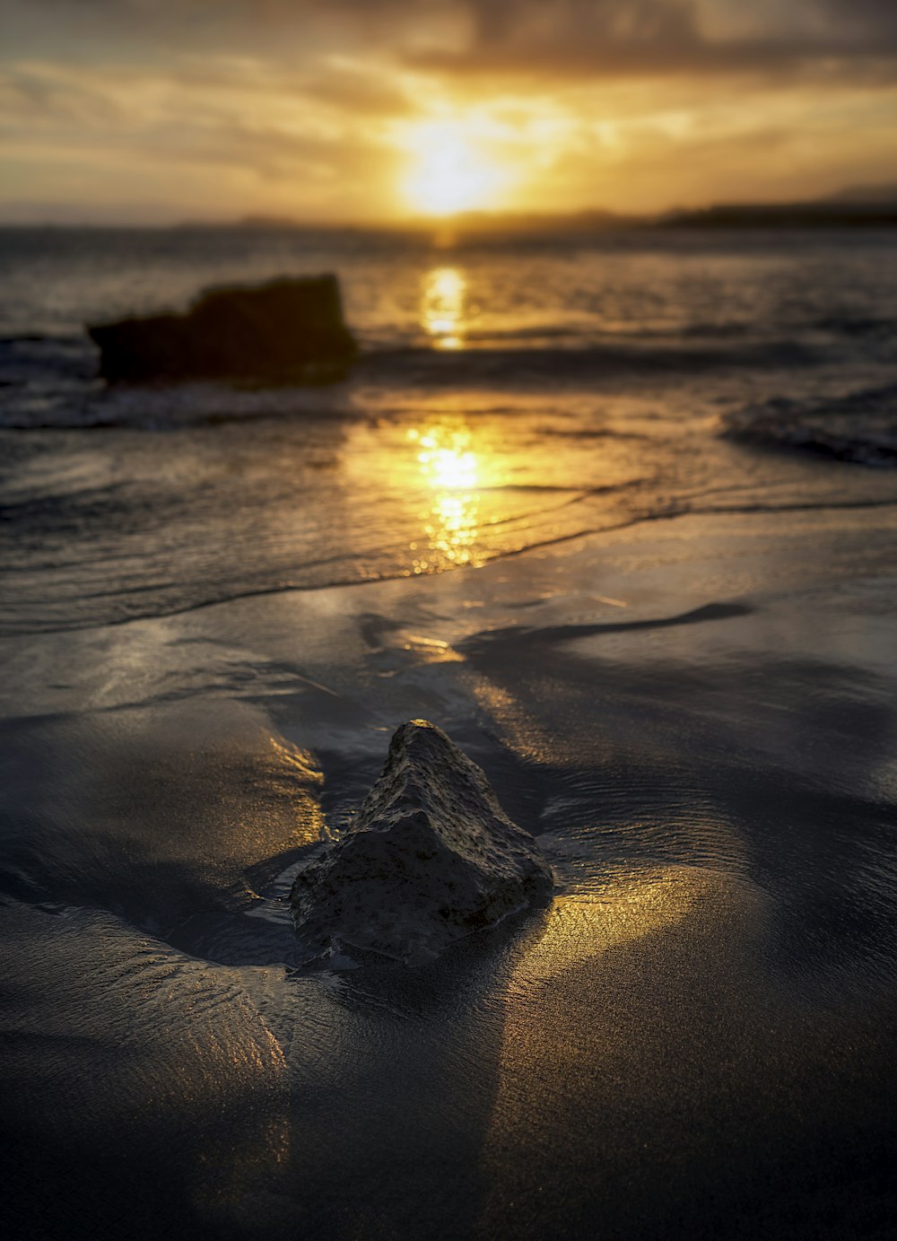 brown rock on sand