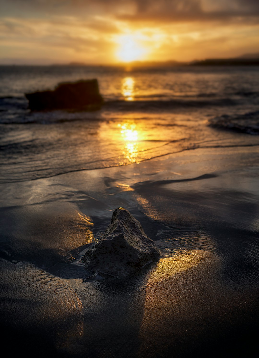 brown rock on sand