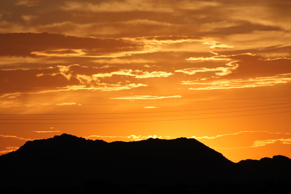 silhouette photography of hills