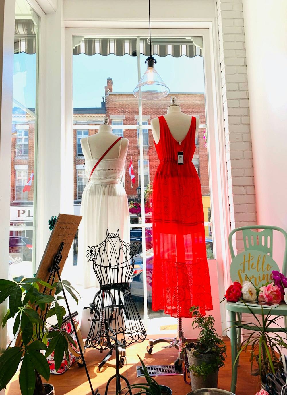 two red and white dress on mannequin