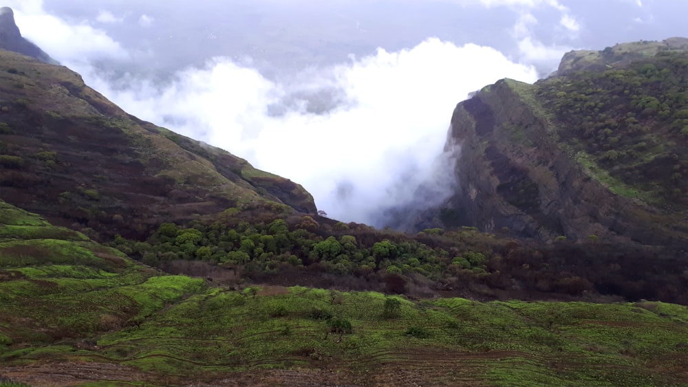 white clouds at mountain