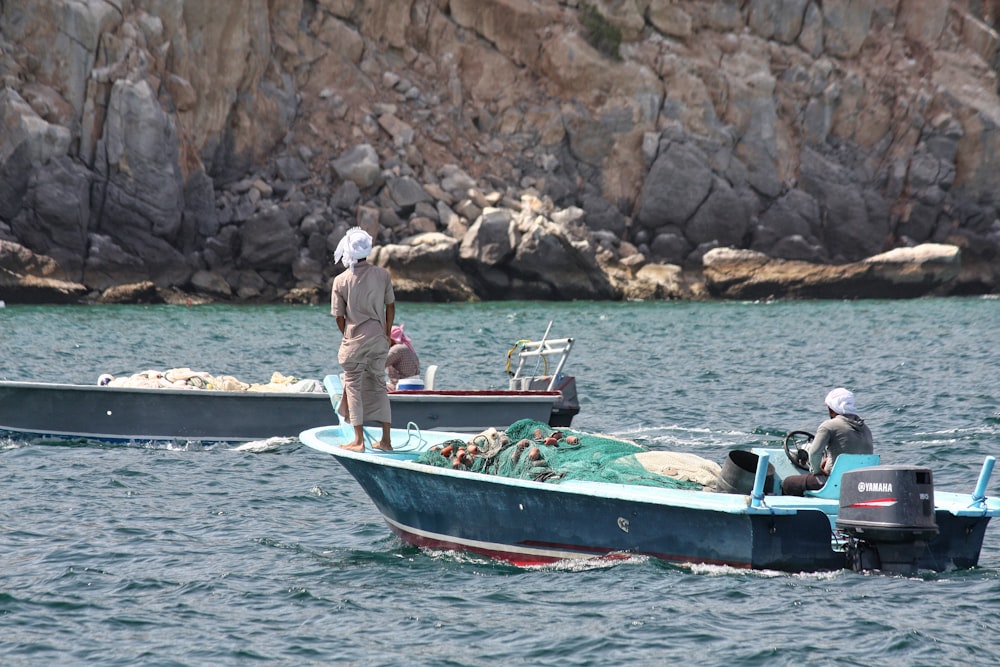 two men on motorized boat