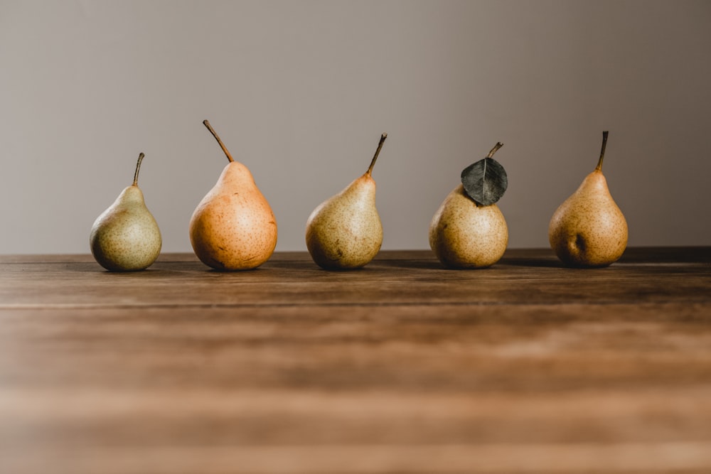 five yellow pear fruits