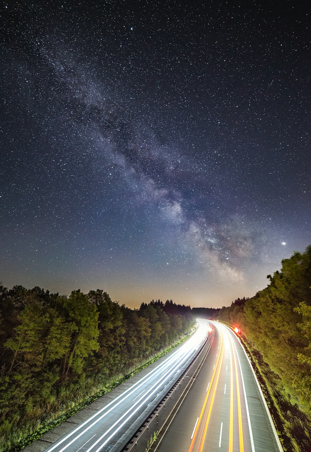 time lapsed photography of vehicles on road during nighttime