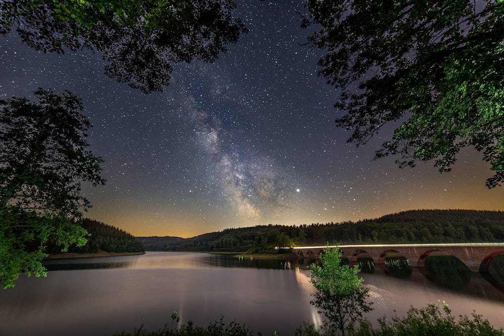 bridge on body of water at nighttime