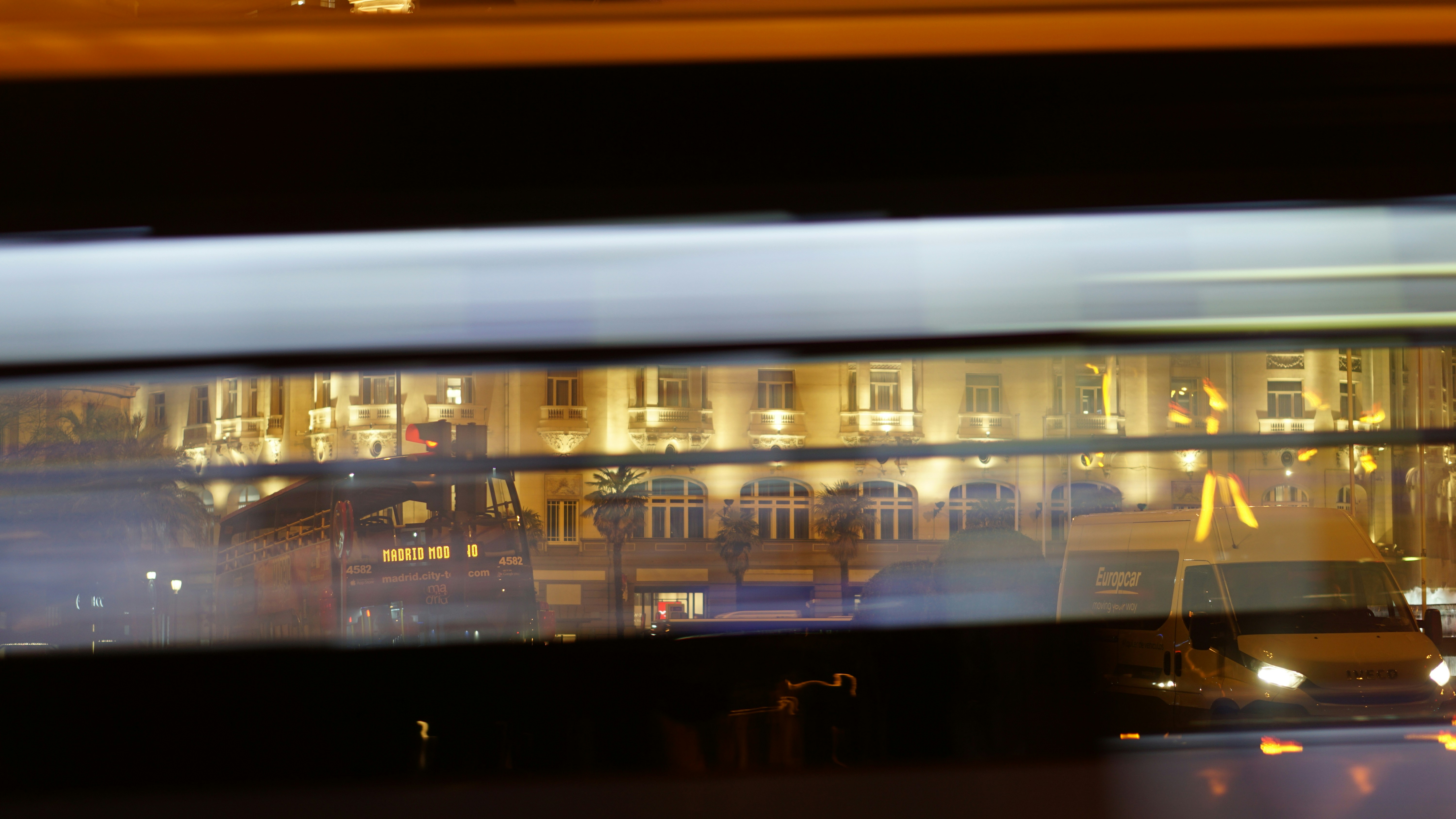 a blurry photo of a city at night