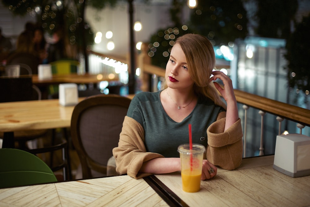 woman sitting at the table