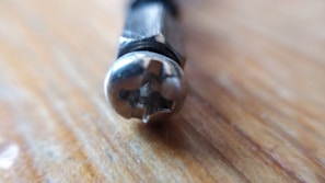 Customer browsing through different types of screwdrivers in the store.