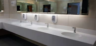 Sanitary facilities in an industrial setting, freshly cleaned and sanitized.