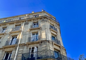 beige concrete high-rise building