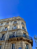 beige concrete high-rise building