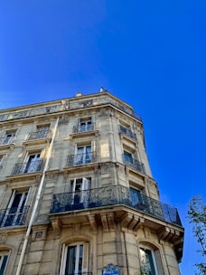 beige concrete high-rise building