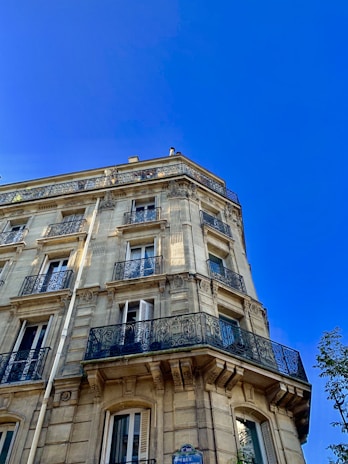 beige concrete high-rise building