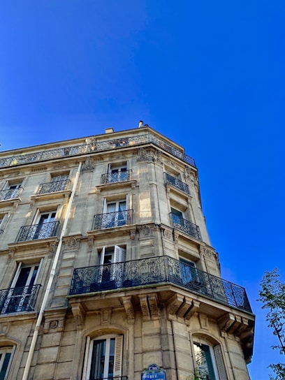 beige concrete high-rise building