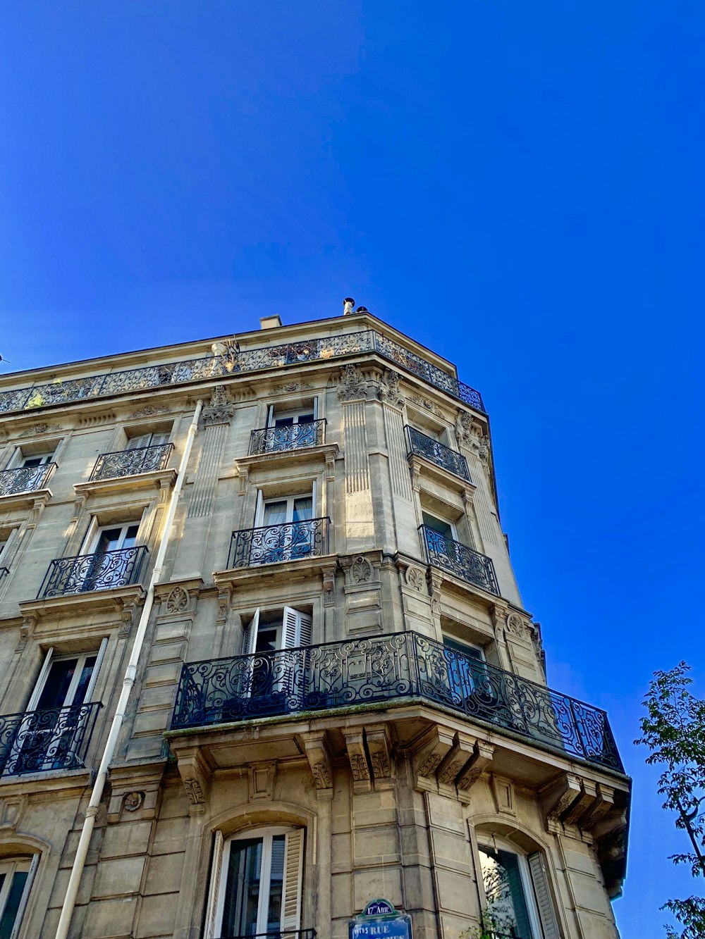 beige concrete high-rise building