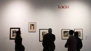 Elaborately Framed Artwork on display at the SeoulHampton Pool Exhibit speaks directly to one man