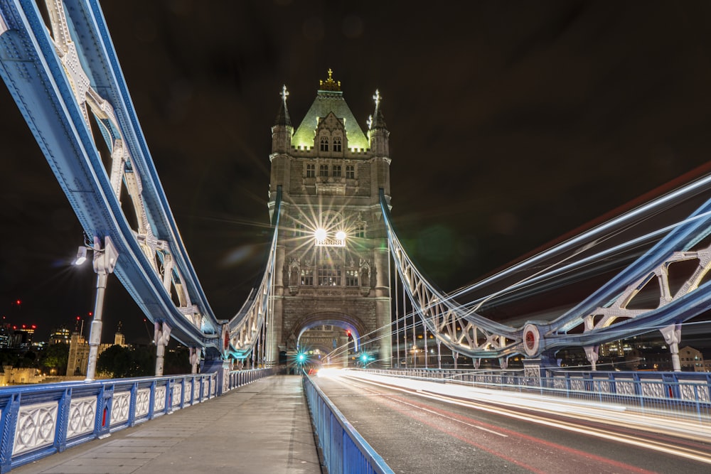 low angle of blue and brown bridge