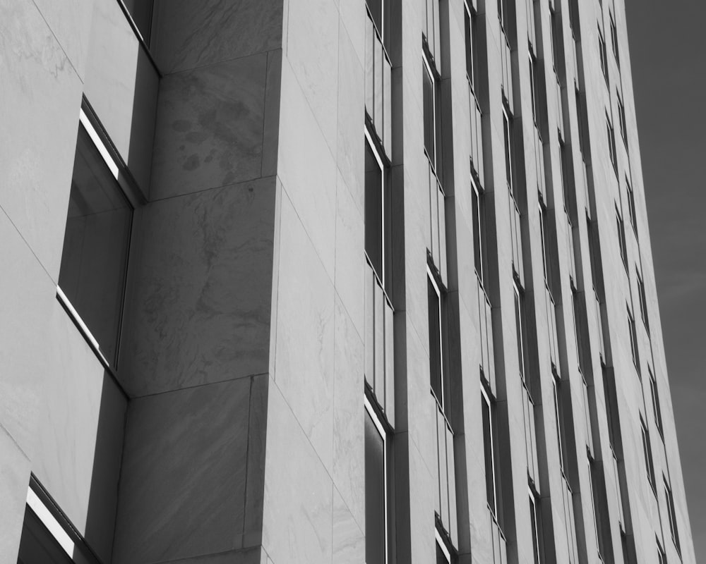 a black and white photo of a tall building