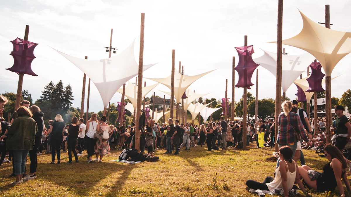 Festival crowd with hands raised : QR code photo sharing delivers personal moments to thousands of guests instantly