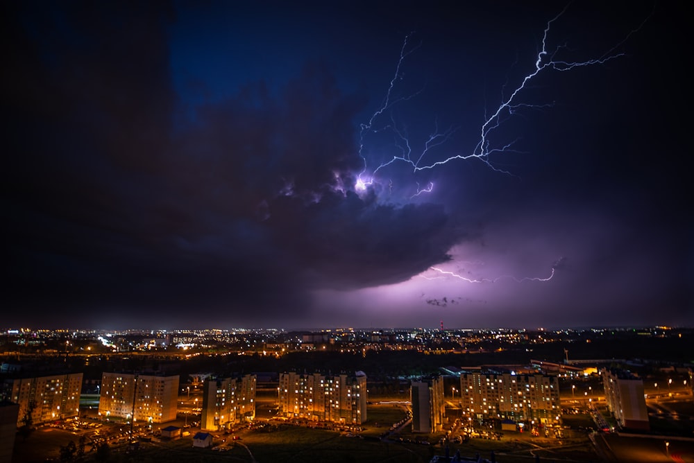 cityscape under purple sky