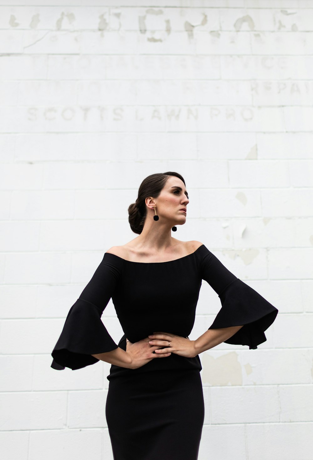 woman wearing black dress