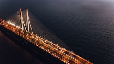brown and gray concrete bridge during daytime top-view photography mumbai google meet background