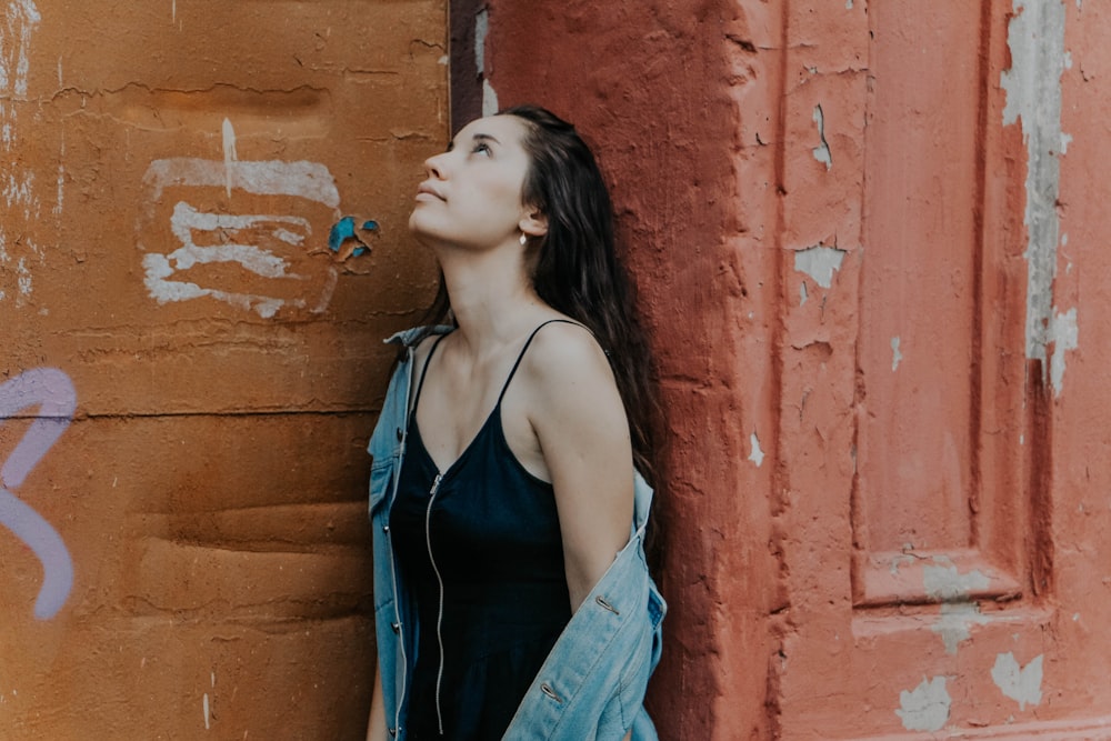 woman wearing black cami top