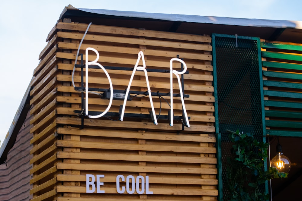 bar neon signage on shop wall