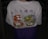 A person is wearing a white t-shirt featuring a vibrant design on the back. The design includes an illustrated tiger and dragon holding chopsticks, with bold colors and stylized elements. There are also some Japanese characters printed above the illustrations.