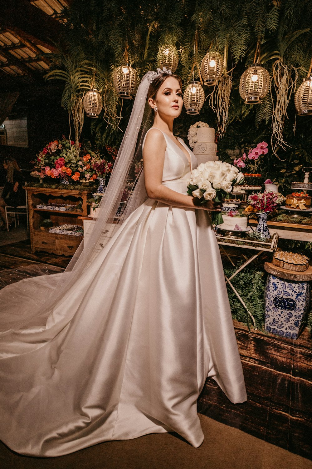 woman holding bouquet of flowers