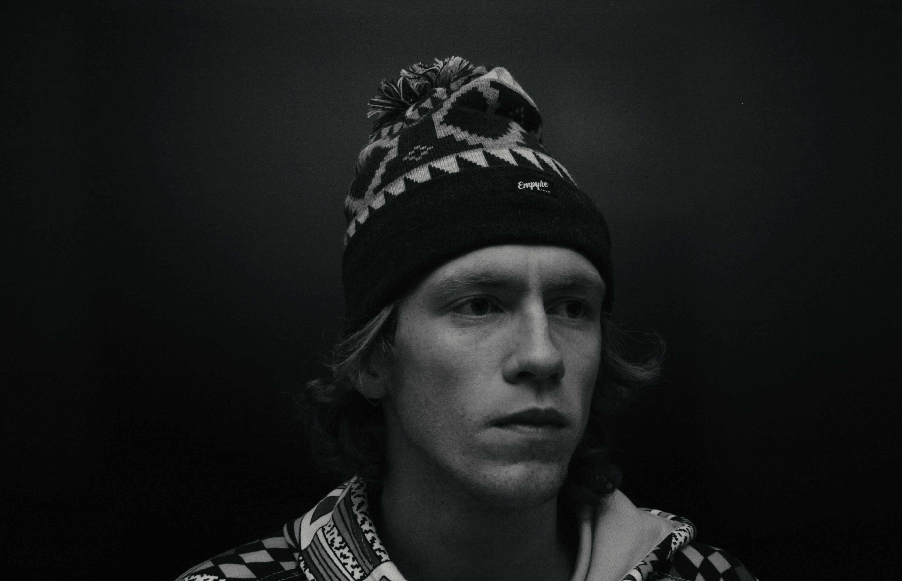 man in black knit cap