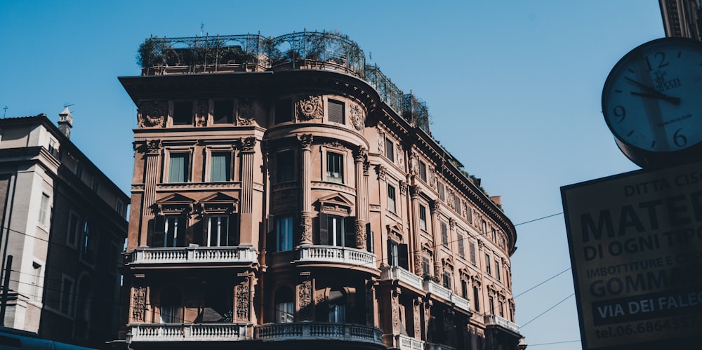 low-angle photography of brown concrete building