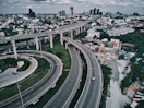an aerial view of a highway in a city