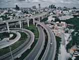an aerial view of a highway in a city