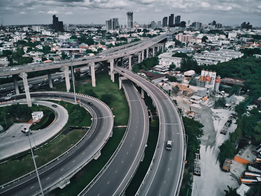 an aerial view of a highway in a city