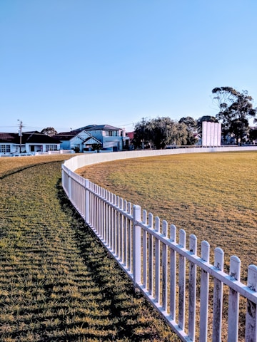 white wooden fence