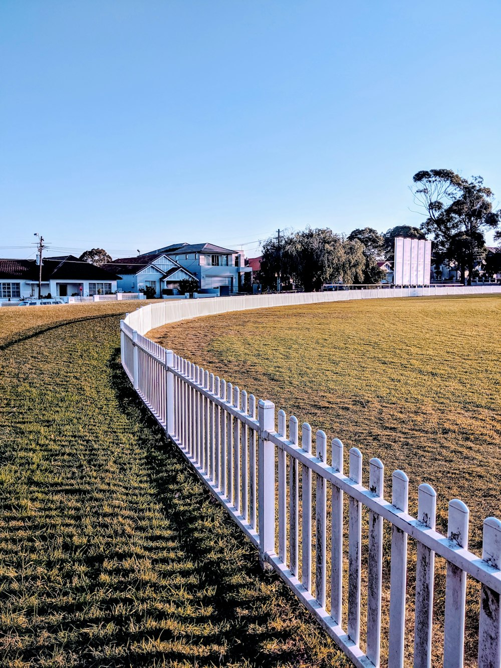 white wooden fence