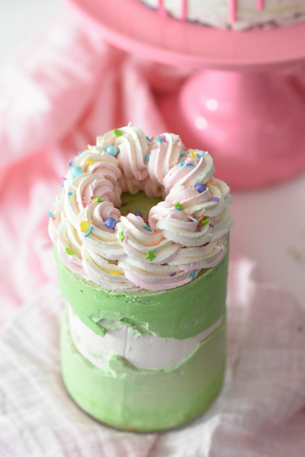 shallow focus photo of green cupcake