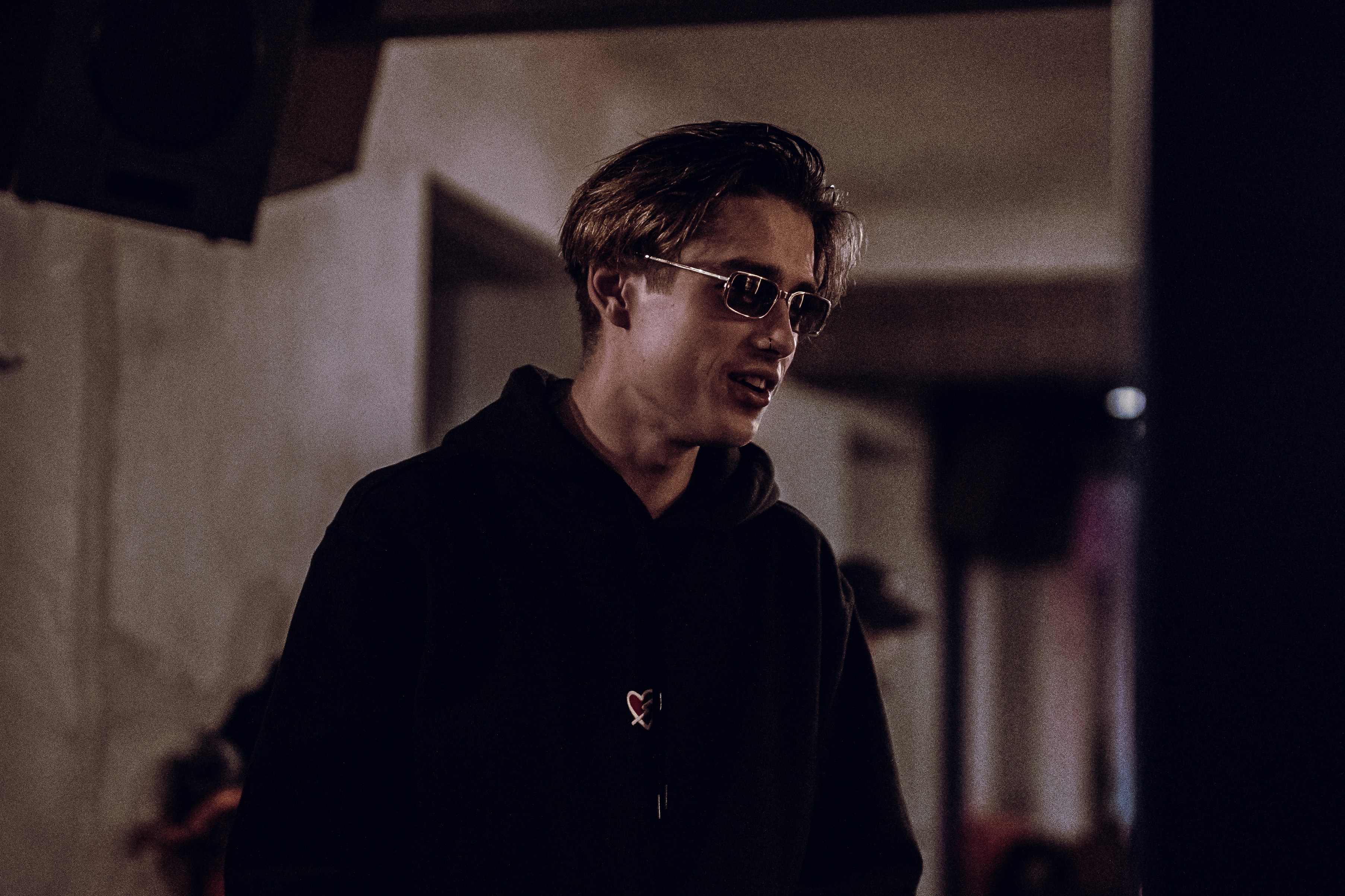 man wearing black jacket and sunglasses