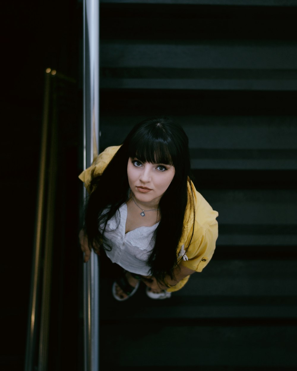 woman standing on stairs