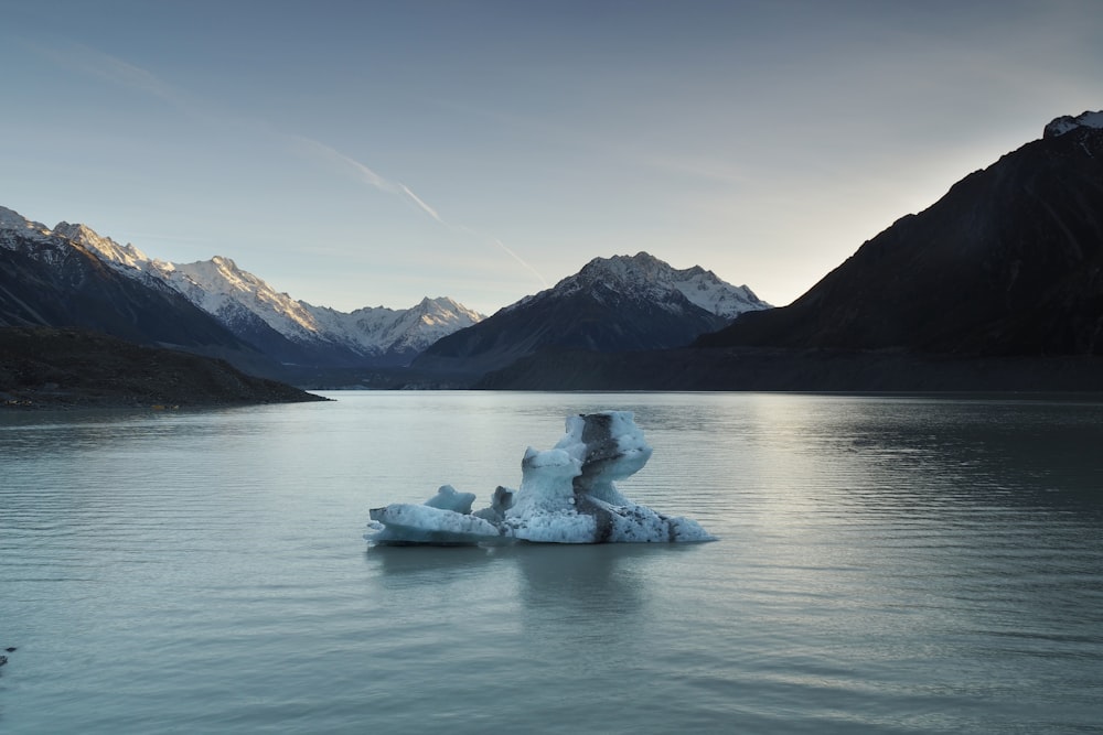 iceberg surrounded by mountains