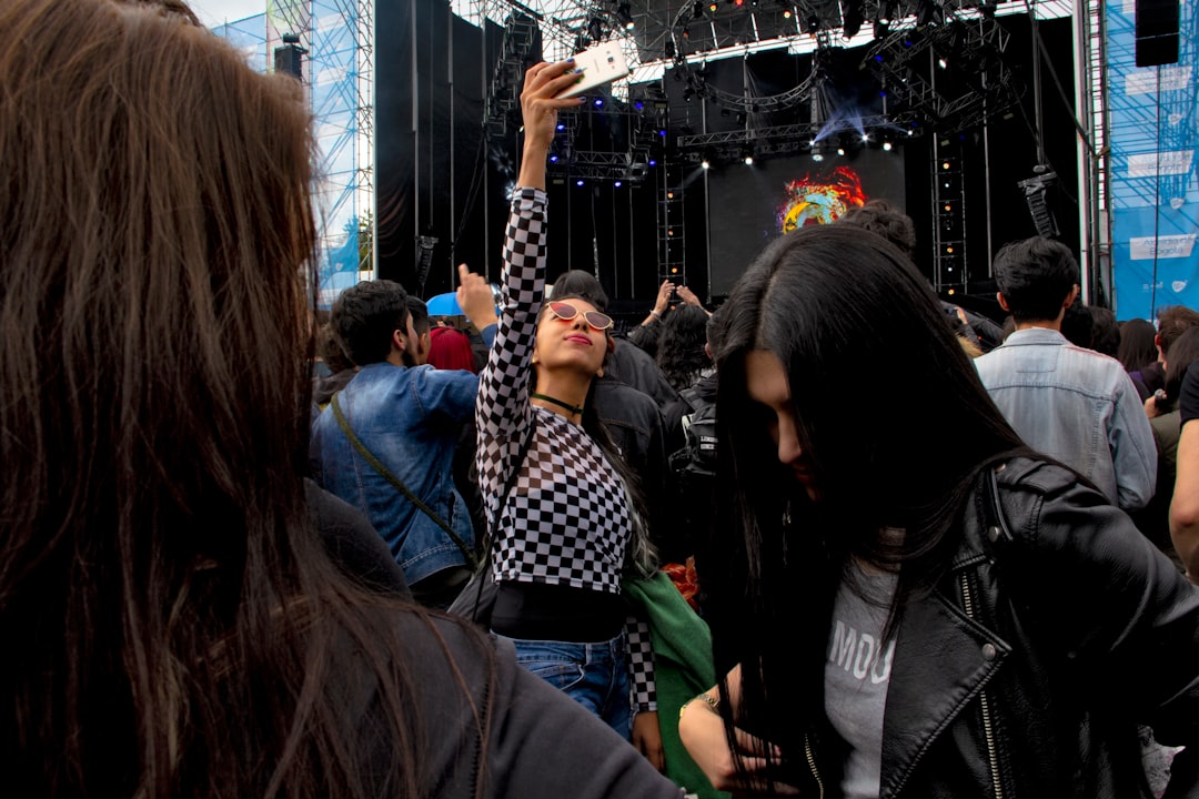 people standing near stage