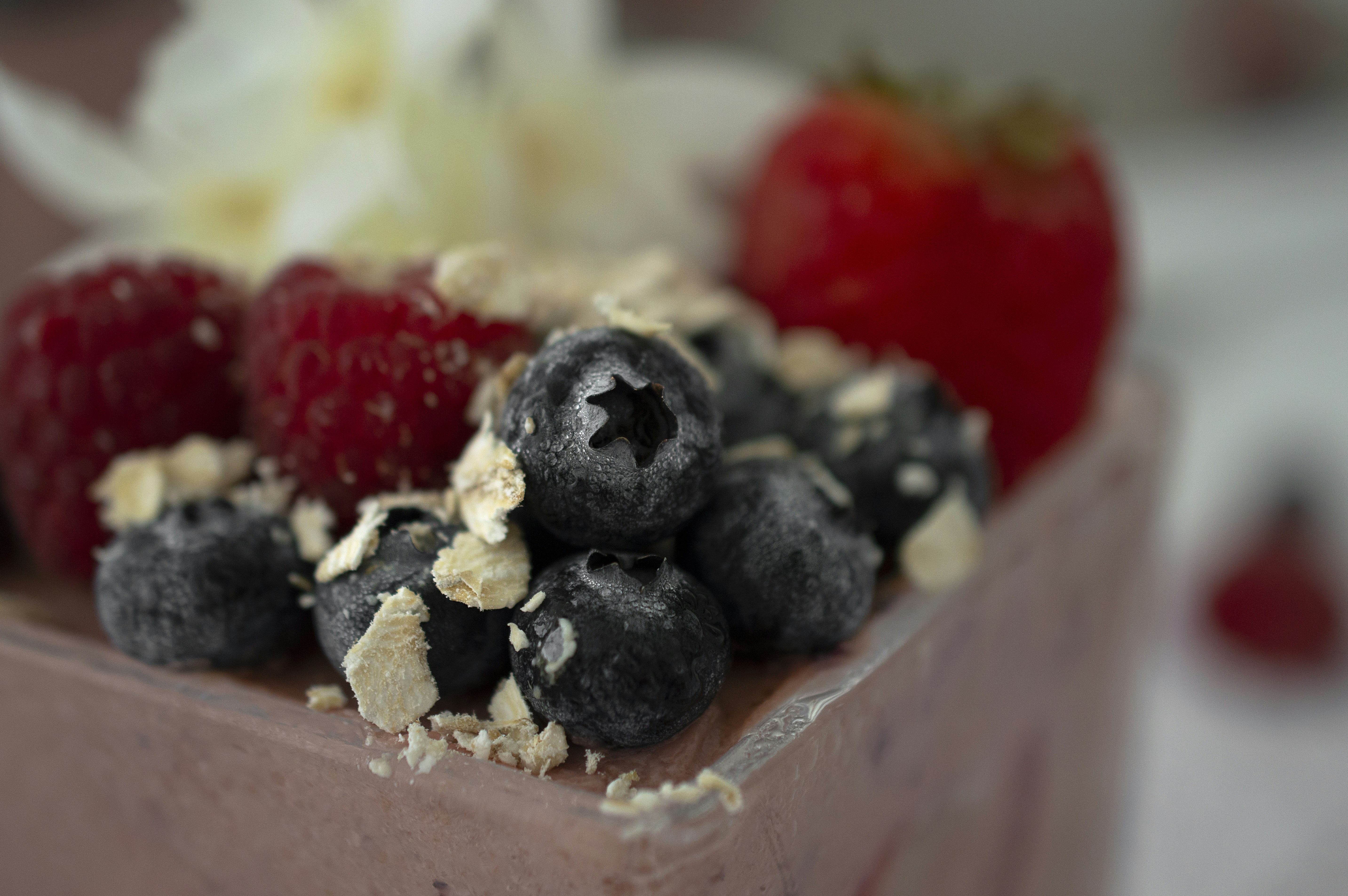 Berry Bliss dessert with mixed berry compote, cashew cream and dark chocolate shavings