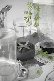 An assortment of mixer attachments and components displayed neatly.