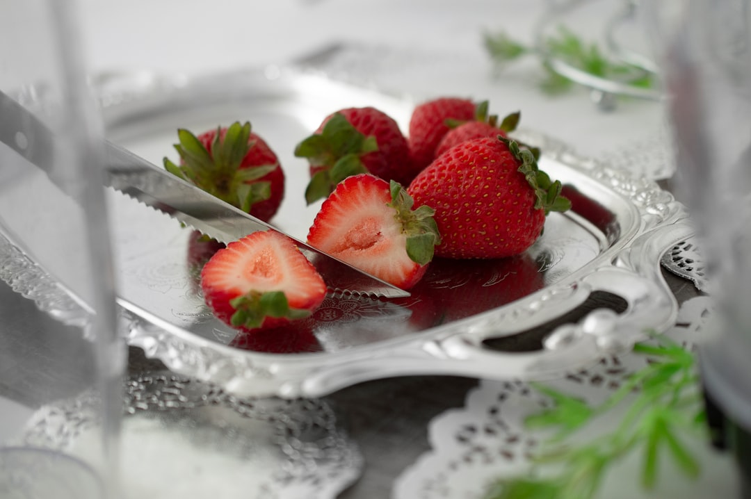 red strawberries on gray tray