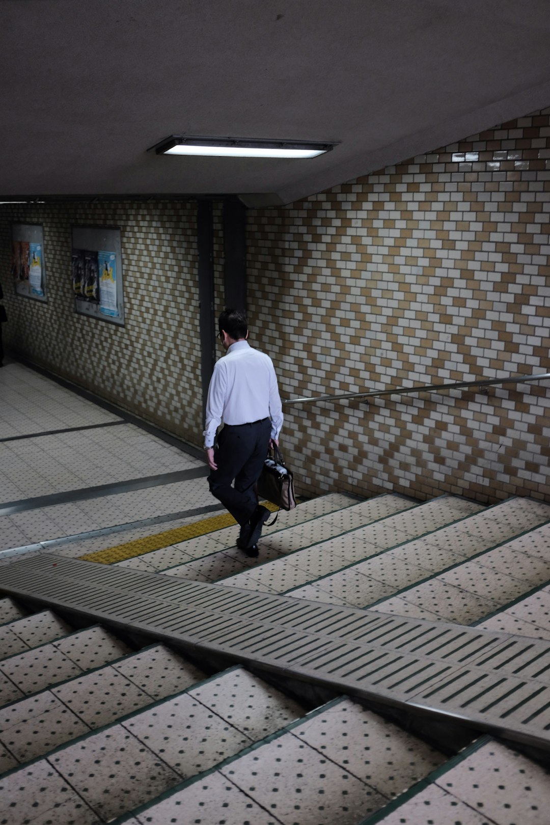 man walking on stairs