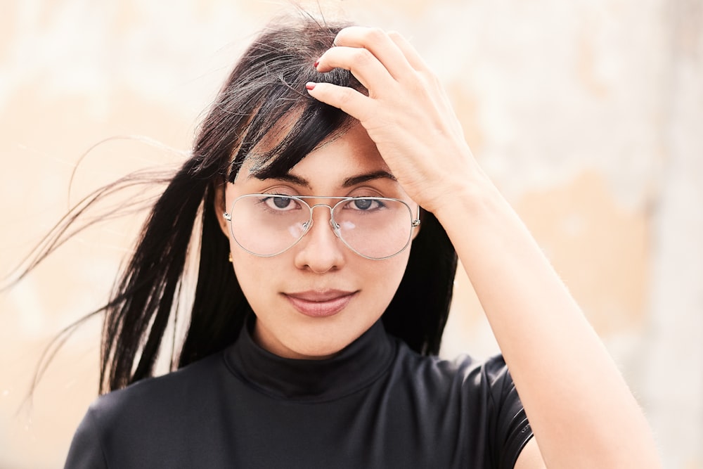 woman holding hair